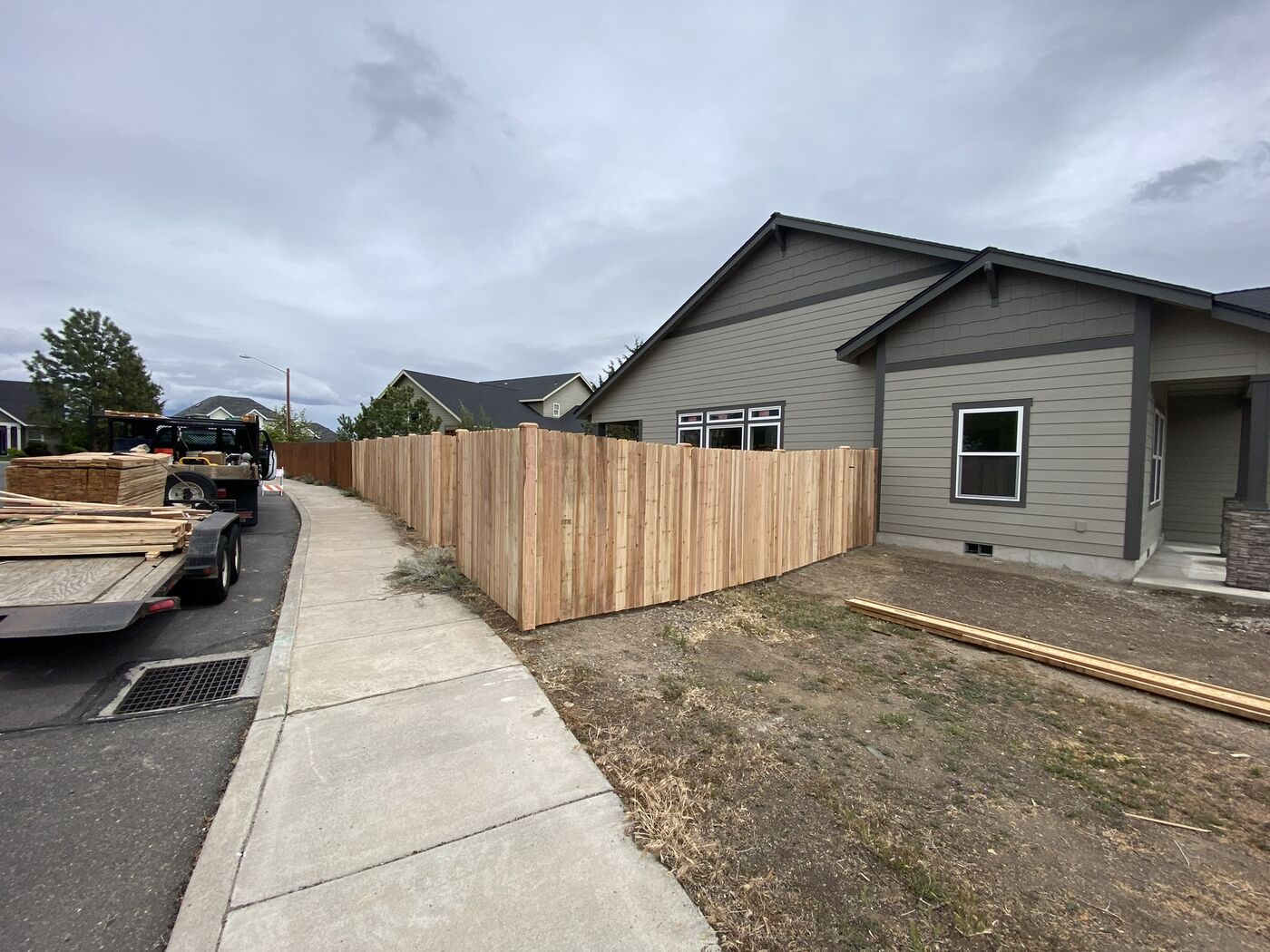 Cedar entry gate with horizontal slats